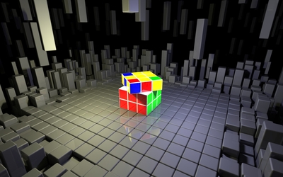 Rubik's Cube on top of gray cubes wallpaper