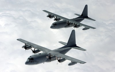 Lockheed C-130 Hercules on top of the fuzzy clouds wallpaper