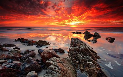 Amazing sunset shades mixing on the wet beach wallpaper