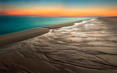 Calm ocean at sunset wallpaper