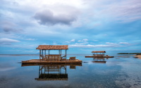 Clouds above the bungalows on the water wallpaper 2560x1600 jpg