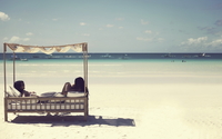 Girls relaxing on a sandy beach wallpaper 3840x2160 jpg