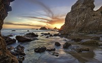 Golden sunset behind the rocky ocean shore [2] wallpaper 1920x1080 jpg