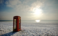 Red telephone booth on a winter beach wallpaper 2560x1600 jpg