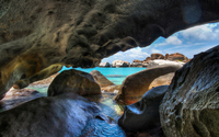 Rocky cave entrance by the ocean wallpaper 2560x1600 jpg