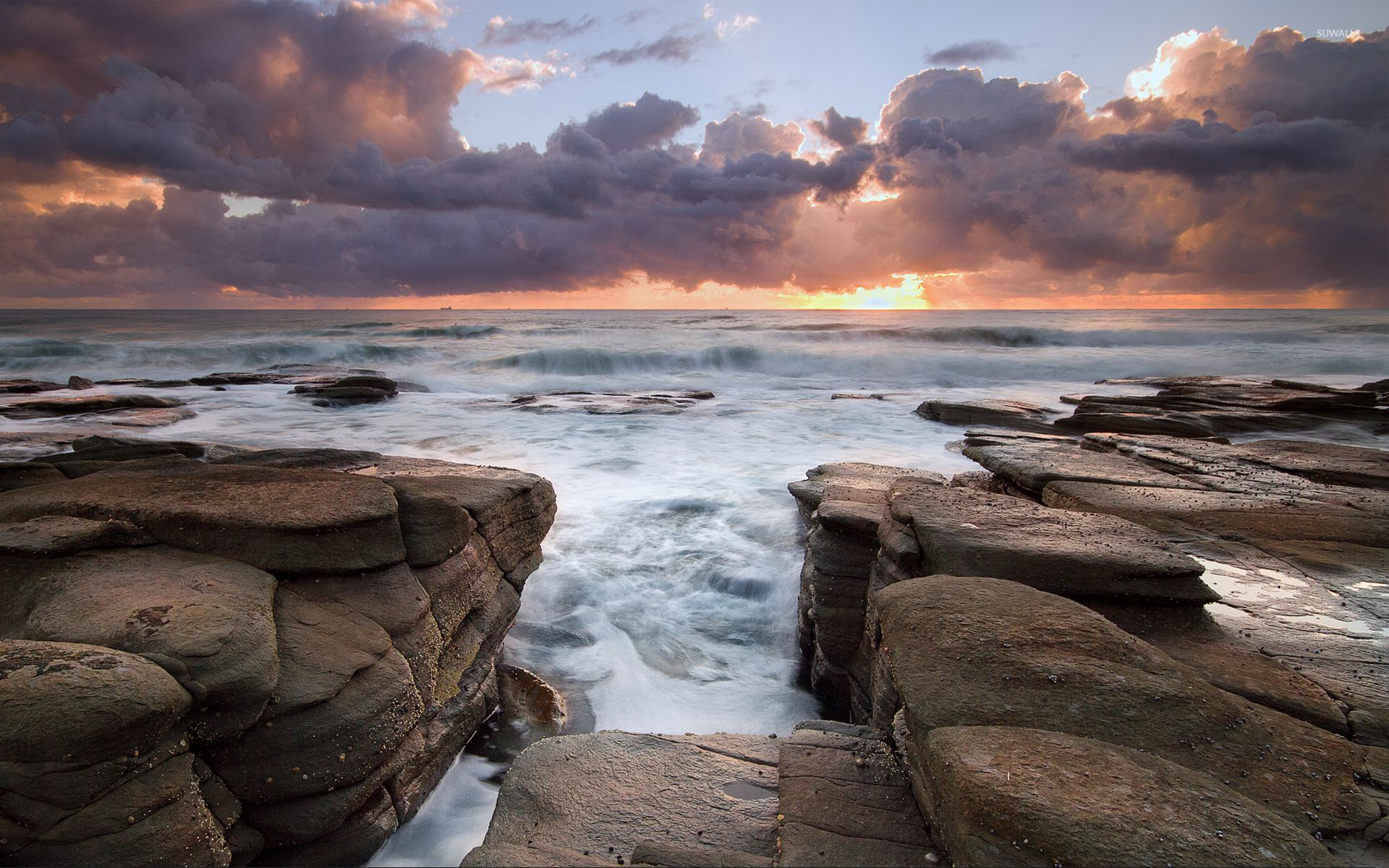 Waves rushing to the rocky shore wallpaper Beach wallpapers 53807