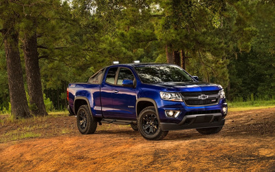 Blue Chevrolet Colorado Z71 in the forest wallpaper