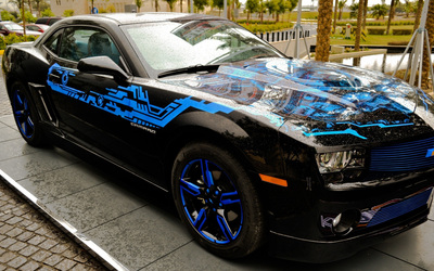 Chevrolet Camaro with blue rims wallpaper