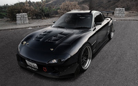 Front side view of a Mazda RX-7 wallpaper 1920x1200 jpg
