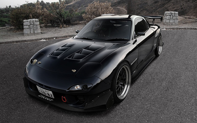 Front side view of a Mazda RX-7 wallpaper