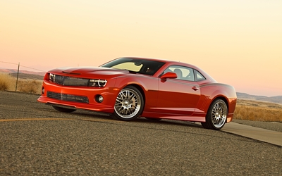 Red Chevrolet Camaro on the road wallpaper
