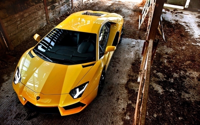 Top view of a yellow Lamborghini Aventador wallpaper