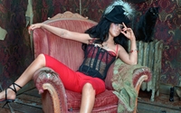 Brunette Christina Aguilera on an armchair wallpaper 1920x1080 jpg
