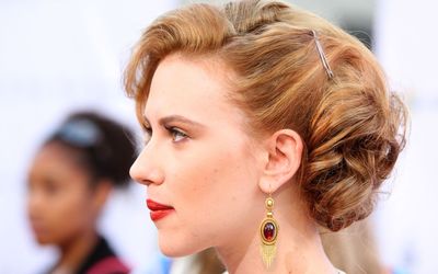 Scarlett Johansson with golden earrings wallpaper