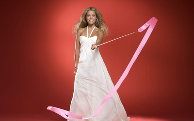Silvie Van Der Vaart playing with a pink ribbon wallpaper