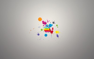 Colorful Apple on paint splash wallpaper