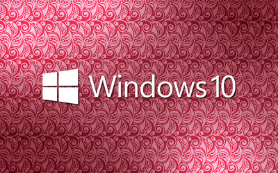 Windows 10 white text logo on a pink pattern wallpaper