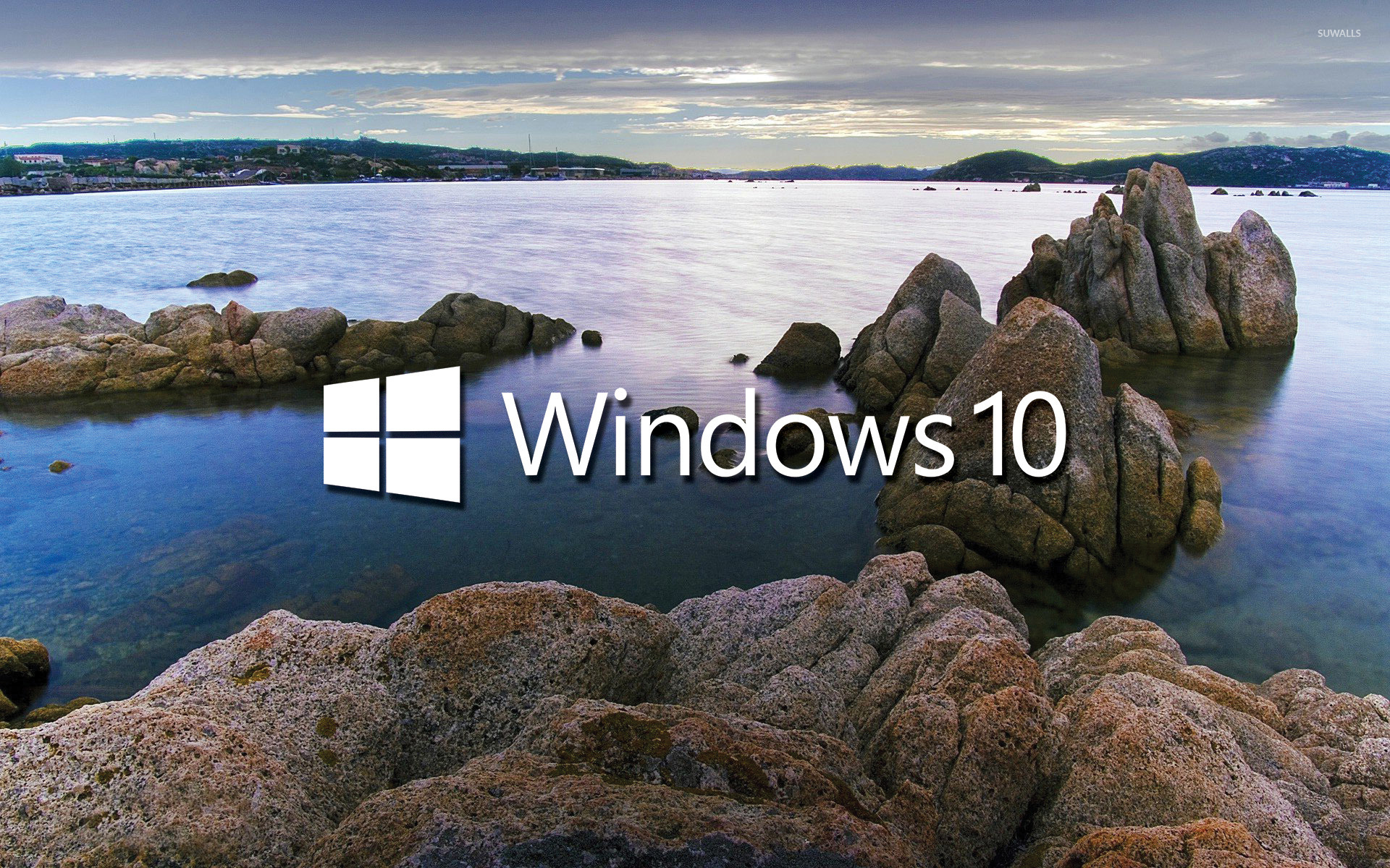 Windows 10 White Text Logo On The Rocky Lake Shore Wallpaper Computer