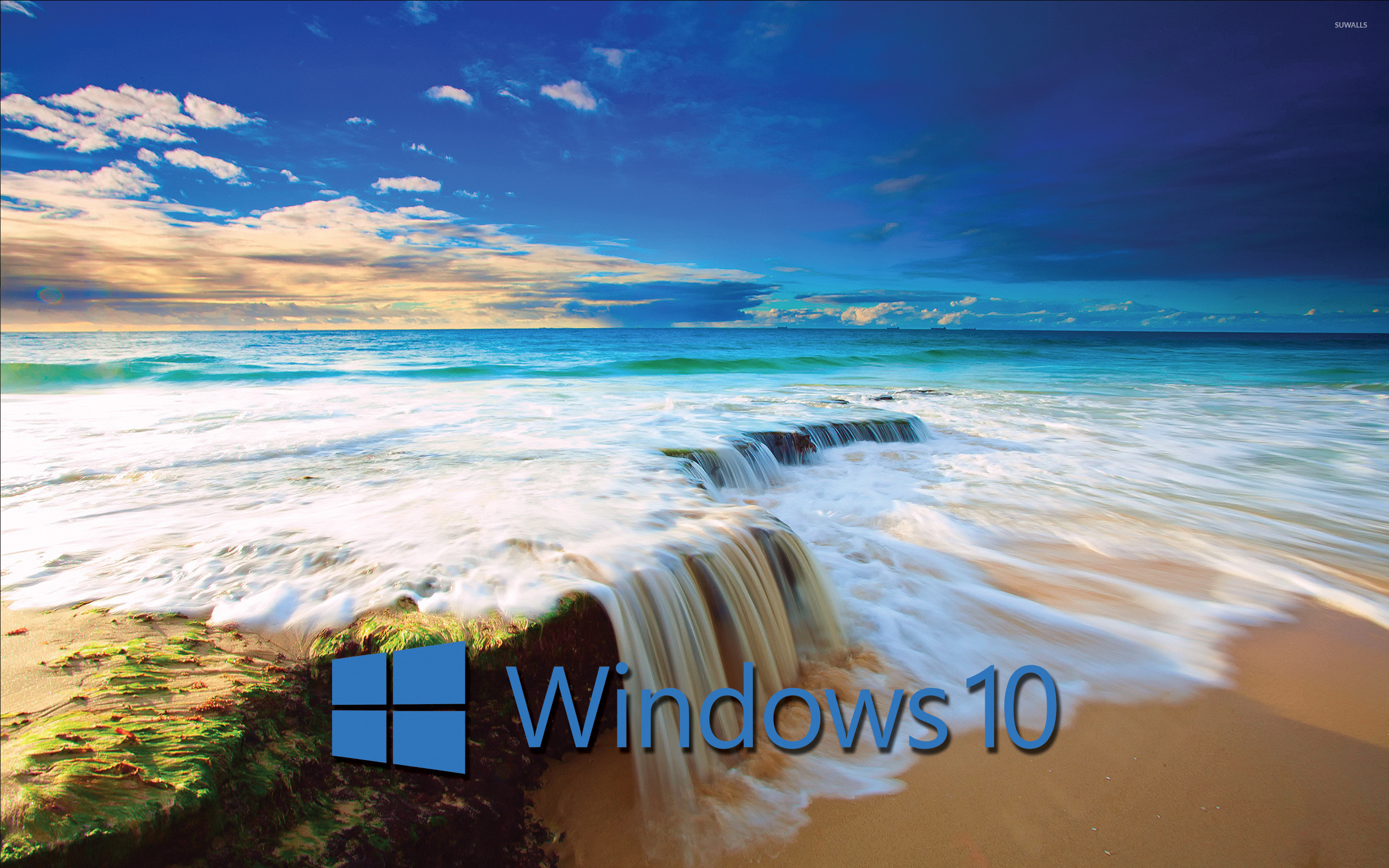 Windows 10 blue text logo on the golden beach wallpaper - Computer ...