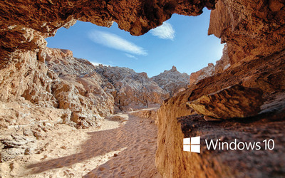 Windows 10 small text logo in a cave wallpaper