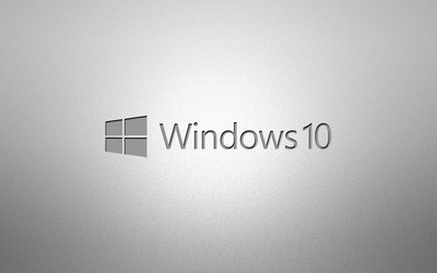 Windows 10 gray text logo on grainy gray wallpaper