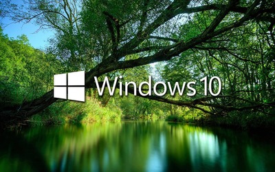 Windows 10 over a green lake white text logo wallpaper