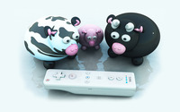 Cows looking at a Wii controller wallpaper 1920x1200 jpg
