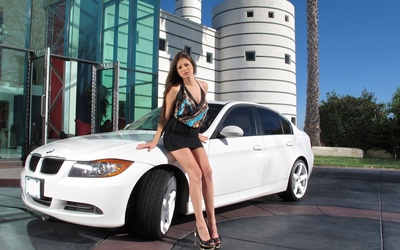 Brunette with a BMW wallpaper