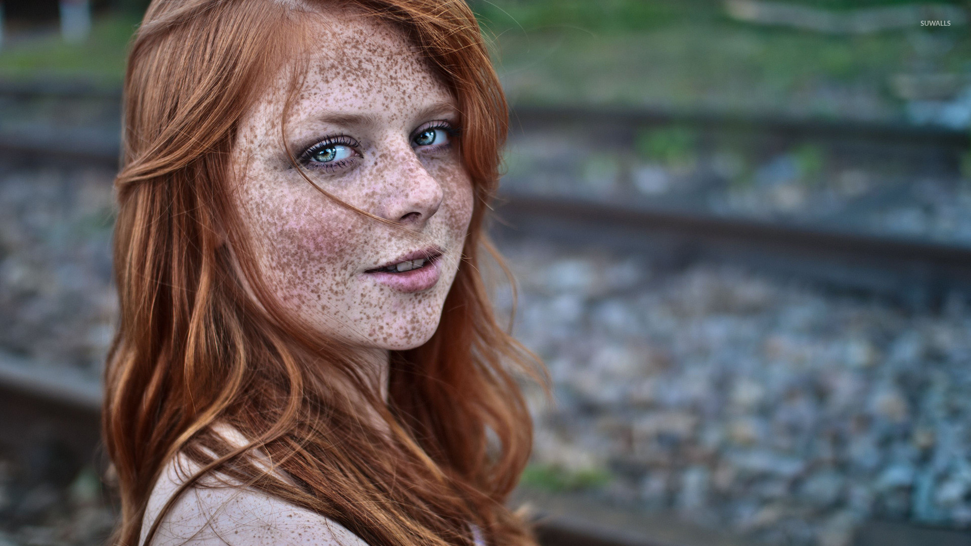 Freckled redhead wallpaper.