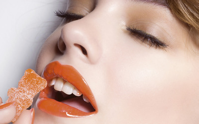 Girl with orange jelly lips Wallpaper