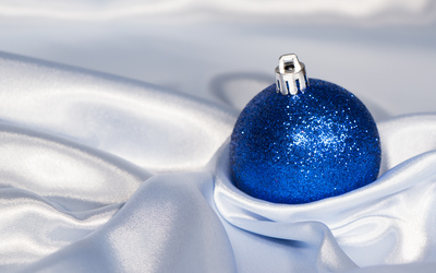 Blue Christmas bauble in silk wallpaper
