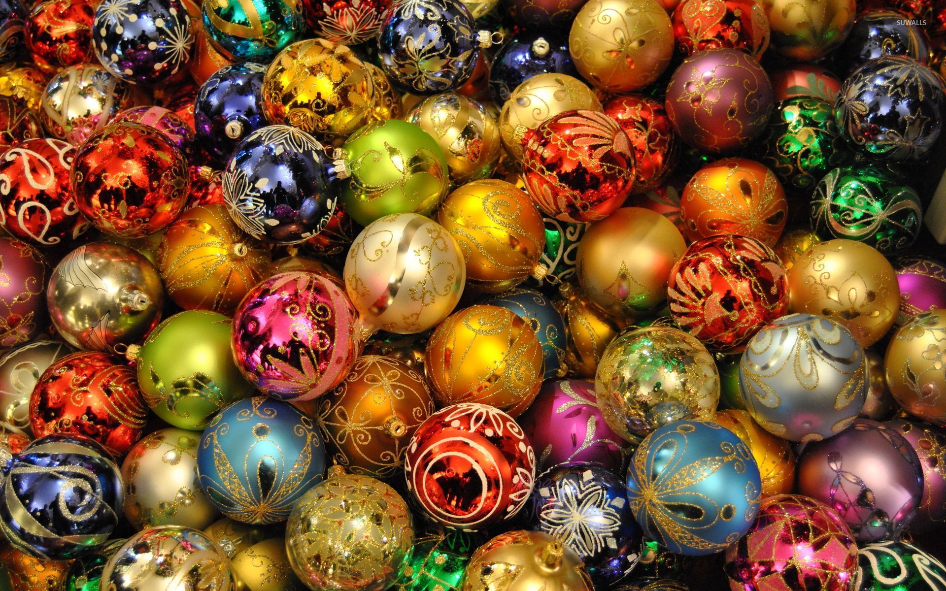 Christmas lights reflecting in the colorful baubles wallpaper  Holiday