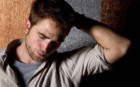 Robert Pattinson with a hand on his hair wallpaper 1920x1200 jpg