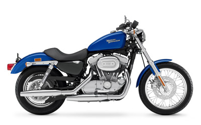 Side view of a blue Harley-Davidson wallpaper