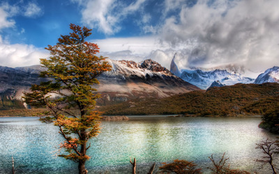 Emerald lake in the Andes mountains wallpaper