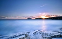 Ocean sunset behind the rocky shore wallpaper 3840x2160 jpg