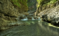 River hiding from the sun between the rocky mountain wallpaper 2560x1600 jpg