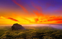 Rock rising from the grass to the gorgeous sunset wallpaper 1920x1080 jpg
