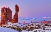 Rusty rocks rising from the snow wallpaper 2560x1600 jpg
