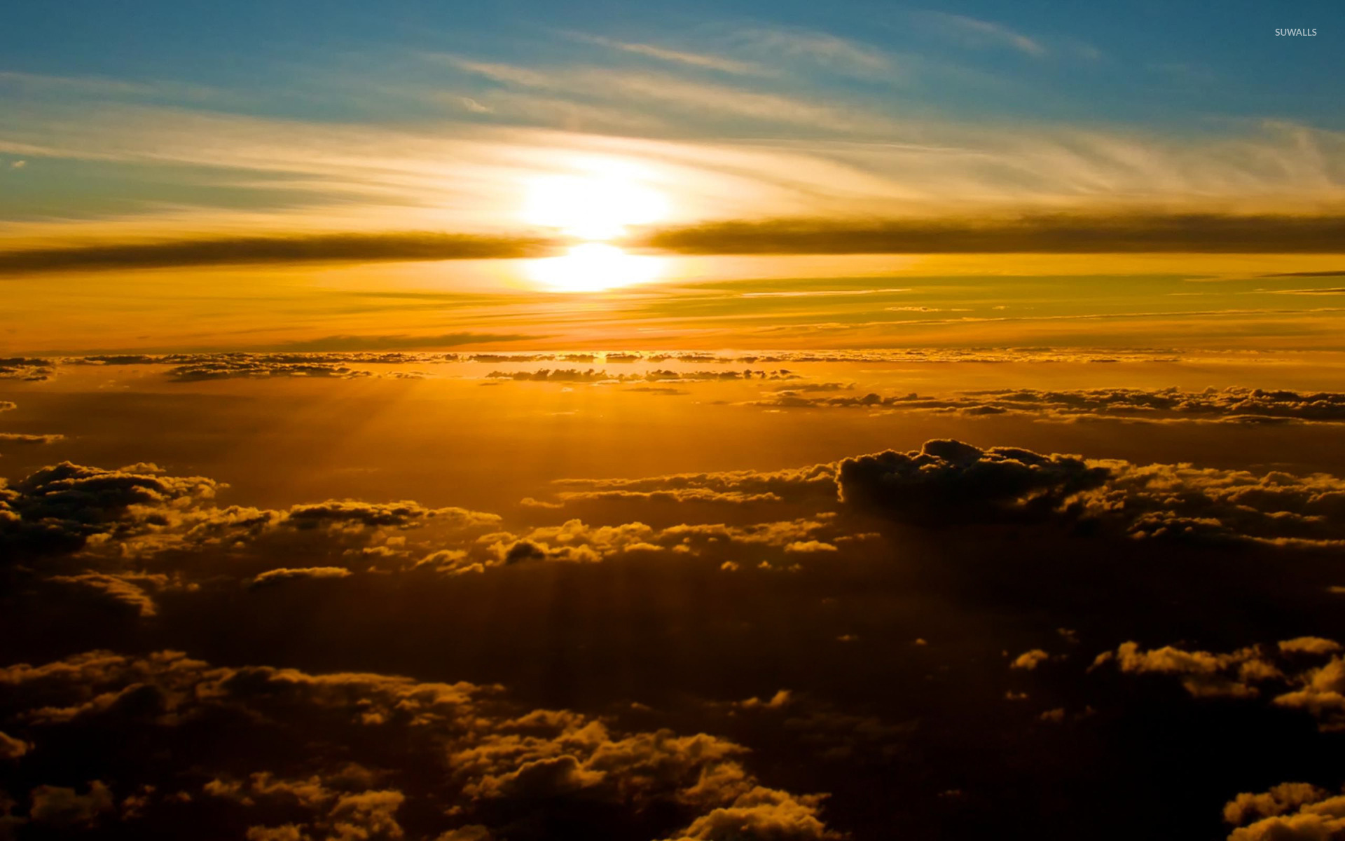 sunset above clouds