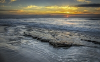 Sunset over the wavy ocean wallpaper 1920x1200 jpg