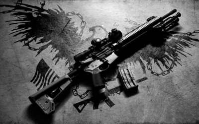 AR-15 rifle on the ground Wallpaper