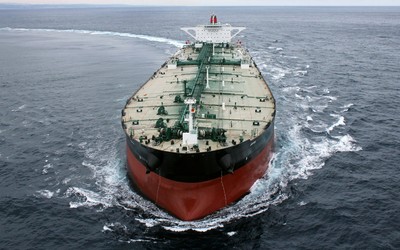 Cargo ship in the ocean wallpaper