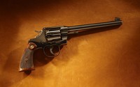 Colt revolver on leather wallpaper 2560x1600 jpg