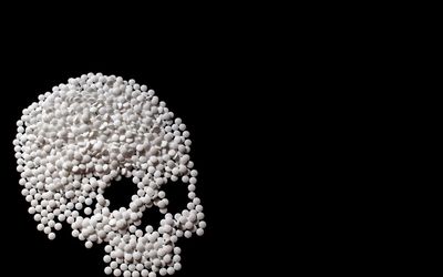 Skull made of pills wallpaper