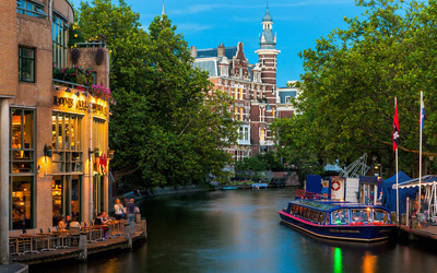 City of Amsterdam on Amstel river wallpaper