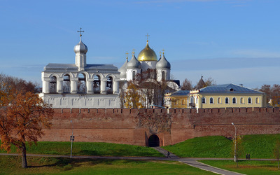 Orthodox church surrounded by an old brick wall wallpaper